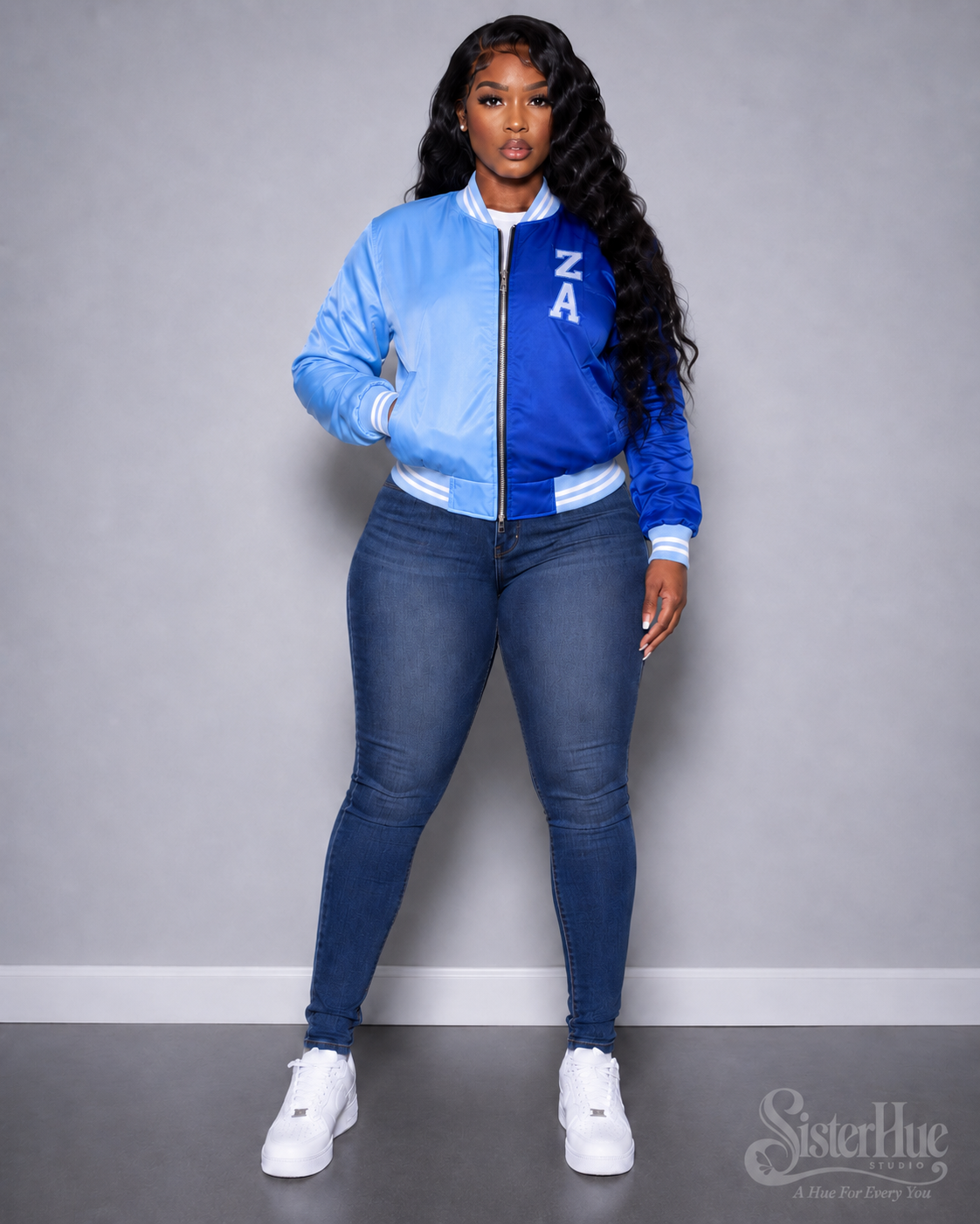 Model wearing the Colorblock Satin Bomber from the SisterHue Studio presale collection